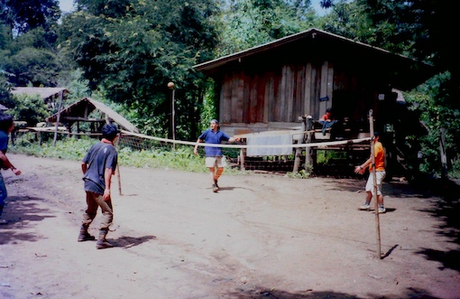 Playing volleyball in Thai village
