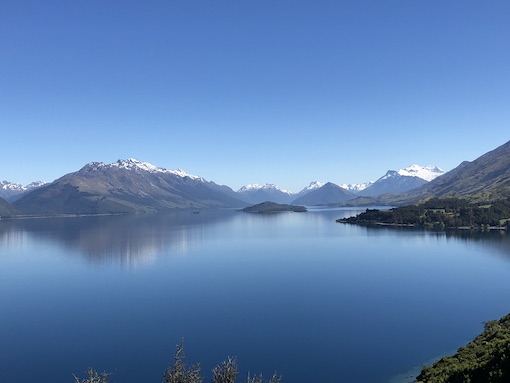 View of Lake Wakatipu and snow covered mountains from the Glenorchy road