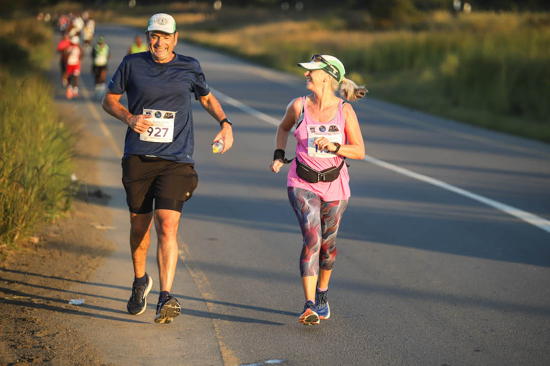 Dave and Sharon Schindler running on the road
